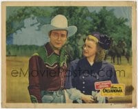 1r574 HOME IN OKLAHOMA LC #8 1946 best close up of Dale Evans looking at cowboy Roy Rogers!