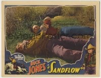 1r794 SANDFLOW LC 1937 close up of Buck Jones struggling to disarm his opponent on the ground!