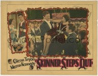 1r822 SKINNER STEPS OUT LC 1929 Glenn Tryon hands Merna Kennedy to other man in orchestra pit!