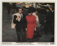 2a039 BREAKFAST AT TIFFANY'S color 8x10 still 1961 Audrey Hepburn & Peppard holding hands on street!
