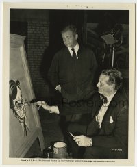 2a908 THIS LOVE OF OURS candid 8.25x10 still 1945 Claude Rains poses for a caricature sketch!