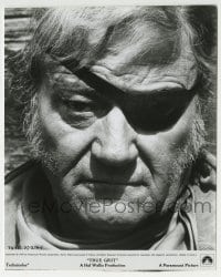 2a936 TRUE GRIT 7.75x9.5 still 1969 best close up of John Wayne as Rooster Cogburn scowling!