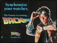 2b059 BACK TO THE FUTURE II teaser British quad 1989 Michael J. Fox as Marty, synchronize your watch