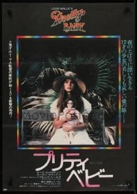 2b956 PRETTY BABY Japanese 1978 directed by Louis Malle, young Brooke Shields sitting with doll!