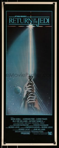 2j356 RETURN OF THE JEDI int'l insert 1983 George Lucas, art of hands holding lightsaber by Reamer!