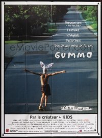 2p823 GUMMO French 1p 1997 wacky image of half-naked man on skateboard & wearing bunny hat!