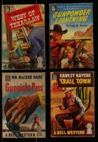 3a439 LOT OF 4 DELL WESTERN PAPERBACK BOOKS 1940s all with great cowboy cover artwork!
