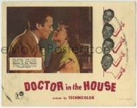 3c423 DOCTOR IN THE HOUSE English LC 1955 c/u of Dr. Dirk Bogarde about to kiss Muriel Pavlow!