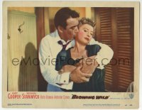3c328 BLOWING WILD LC #8 1953 Anthony Quinn grabs bored Barbara Stanwyck from behind & kisses her!