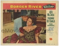 3c335 BORDER RIVER LC #5 1954 c/u of Joel McCrea helping sexy Yvonne De Carlo get up off the floor!