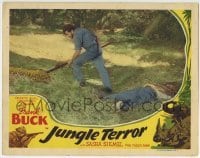 3c577 JUNGLE TERROR LC 1946 Frank Buck examines leopard he shot after it attacked his friend!