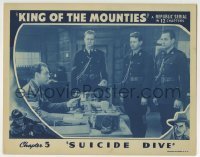 3c586 KING OF THE MOUNTIES chapter 5 LC 1942 Allan Lane at desk talks to 3 of his men, Suicide Dive!