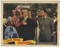 3c593 LADY FROM LOUISIANA LC 1941 John Wayne in suit and tie watches Ona Munson & Henry Stephenson!