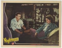 3c710 NIGHTMARE LC 1942 Brian Donlevy staring at sexy Diana Barrymore laying on burlap sacks!