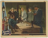3c811 SCARLET STREET LC 1945 Fritz Lang noir, police show the murder weapon to Dan Duryea!