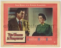 3c897 THIS WOMAN IS DANGEROUS LC #7 1952 c/u of Dennis Morgan staring at worried Joan Crawford!