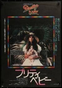 3f661 PRETTY BABY Japanese 1978 directed by Louis Malle, young Brooke Shields sitting with doll!