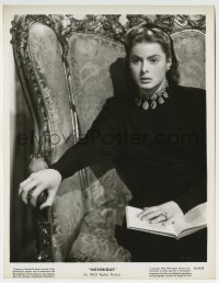 3m726 NOTORIOUS 8x10.25 still 1946 seated portrait of Ingrid Bergman w/book in her lap, Hitchcock!