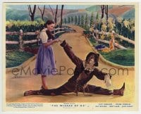 3m119 WIZARD OF OZ color English FOH LC R1955 Dorothy helps fallen Scarecrow get back up!