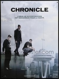 3p648 CHRONICLE teaser French 1p 2012 teen superheroes on edge of building by Seattle skyline!