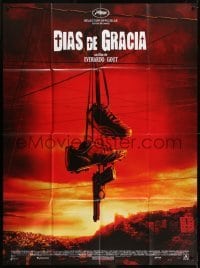 3p683 DIAS DE GRACIA French 1p 2011 great image of shoes & gun hanging from power lines!