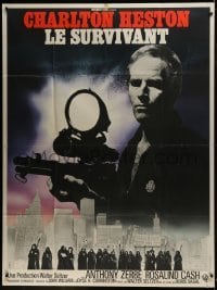 3p824 OMEGA MAN French 1p 1971 best different image of Charlton Heston with huge gun over city!