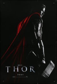 3w887 THOR teaser DS 1sh 2011 cool image of Chris Hemsworth w/classic hammer, shows title!