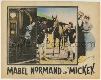 3z712 MICKEY LC 1918 maid Mabel Normand sliding down rail, wearing horse gear & in fancy dress!