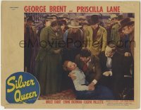 3z854 SILVER QUEEN LC 1942 crowd watches George Brent holding unconscious Priscilla Lane!