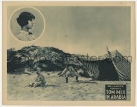 3z927 TOM MIX IN ARABIA LC 1922 Tom Mix with whip sneaks up behind guy sitting on ground, Bedford
