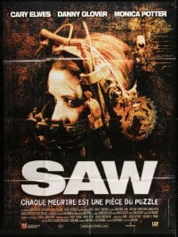 4j934 SAW French 1p 2004 gory serial killer, great image of Shawnee Smith in diabolical device!