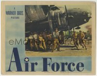 4p026 AIR FORCE LC 1944 Howard Hawks, lots of men pushing airplane in the heat of battle!