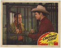 4p158 CHEROKEE FLASH LC 1945 close up of Sunset Carson staring at Roy Barcroft behind bars!