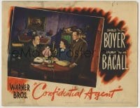 4p181 CONFIDENTIAL AGENT LC 1945 Charles Boyer looks at Peter Lorre & Katina Paxinou at table!