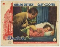 4p231 DESIRE LC 1936 John Halliday tries to rouse sleeping jewel thief Marlene Dietrich in bed!