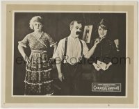 5b735 HOME RULE LC 1920 Chester Conklin winks at pretty uniformed girl as his wife glares!