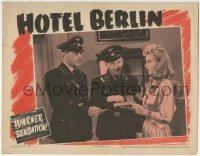 5b738 HOTEL BERLIN LC 1945 pretty Andrea King offers a cigarette to Nazi officers in WWII!