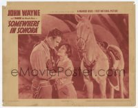 5b889 SOMEWHERE IN SONORA LC R1939 Duke the Miracle Horse approves of John Wayne hugging his girl!