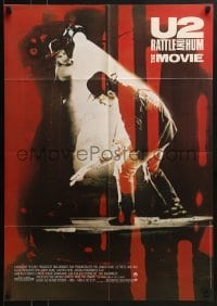 5c305 U2 RATTLE & HUM German 1988 great image of rockers Bono & The Edge performing on stage!