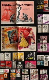 5d246 LOT OF 42 UNCUT PRESSBOOKS 1950s-1970s advertising for a variety of different movies!