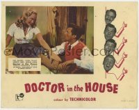 5h325 DOCTOR IN THE HOUSE English LC 1955 image of Dr. Dirk Bogarde examining sexy Muriel Pavlow!