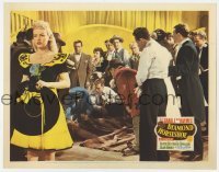 5h317 DIAMOND HORSESHOE LC 1945 Betty Grable looks worried as Dick Haymes helps man on floor!
