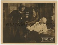 5h380 FLYING ACE LC 1926 Kathryn Boyd tries to stop policeman from arresting old man, Norman Films!