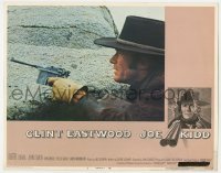 5h523 JOE KIDD LC #3 1972 great close up of Clint Eastwood with gun drawn hiding behind rock!