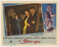 5h860 STRANGER LC 1946 Edward G. Robinson looks shocked at Orson Welles holding Loretta Young!