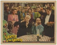 5h863 STRICTLY IN THE GROOVE LC 1942 Shemp Howard throws tomato at annoying Leon Errol with flute!