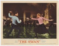 5h866 SWAN LC #2 1956 Grace Kelly given a fencing lesson by Louis Jourdan, the palace tutor!