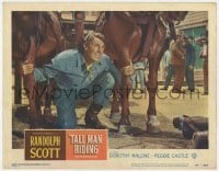 5h874 TALL MAN RIDING LC #4 1955 close up of cowboy Randolph Scott kneeling between two horses!
