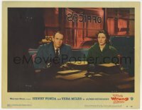 5h984 WRONG MAN LC #8 1957 Henry Fonda & Vera Miles in office, Alfred Hitchcock directed!
