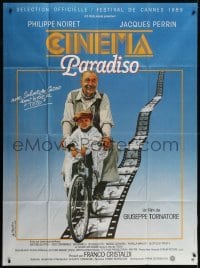 5j689 CINEMA PARADISO French 1p 1989 great image of Philippe Noiret & Salvatore Cascio on bike!